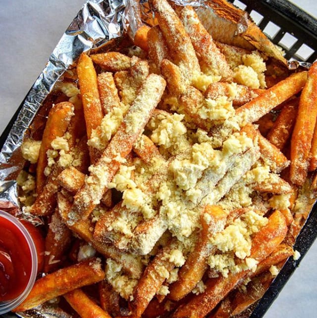 Beer Battered Fresh Garlic Parmesan Fries.